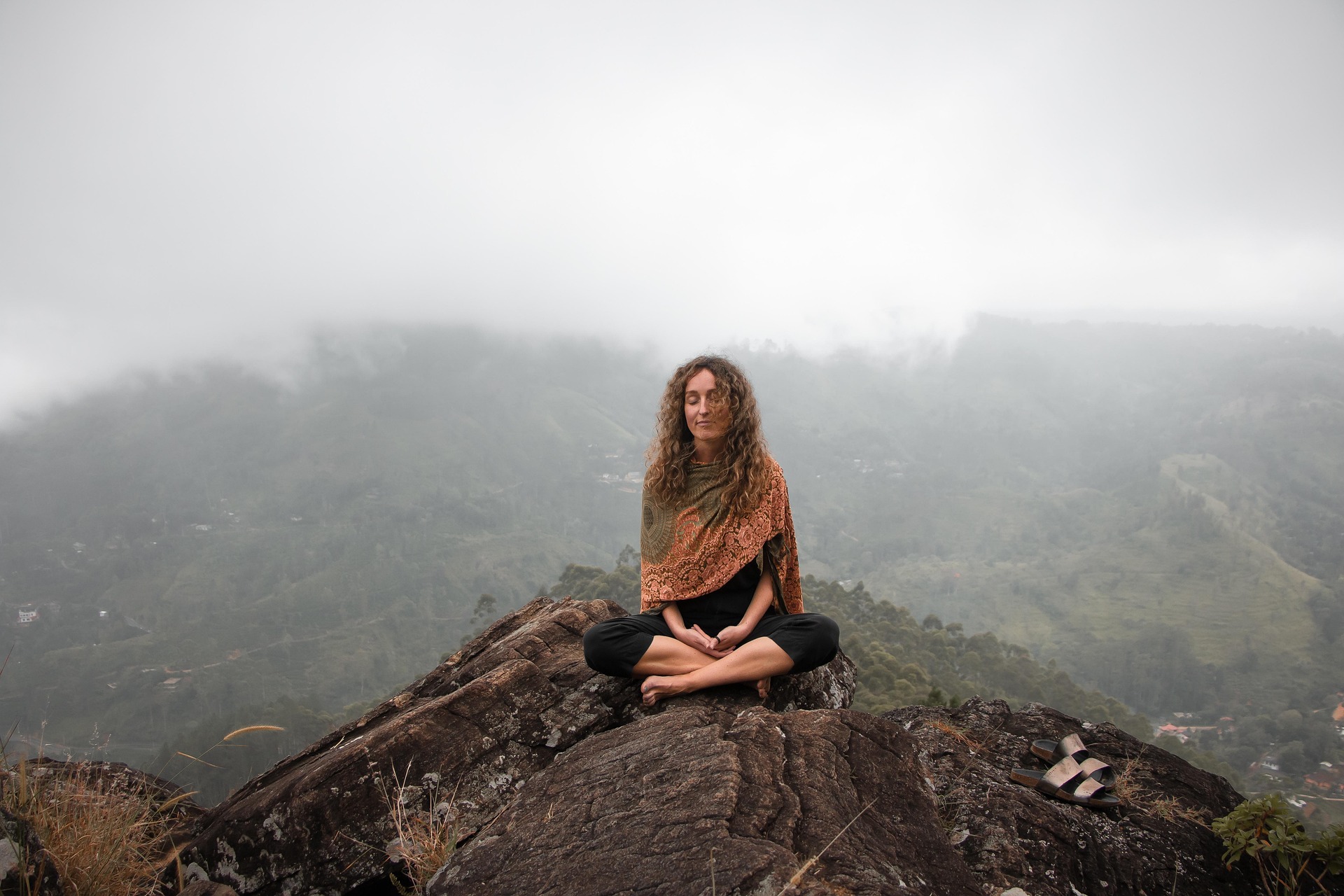 spiritual woman on rock